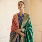 a-graceful-woman-wearing-a-traditional-b_FsQkHPRbR2-m8V5XQx-Ipw_reKEk6D1S8ewbT4VlGtJTw.jpeg